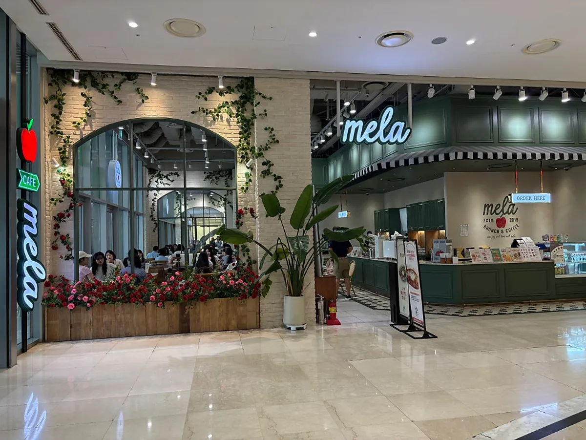 Exterior of Mela brunch restaurant inside Times Square