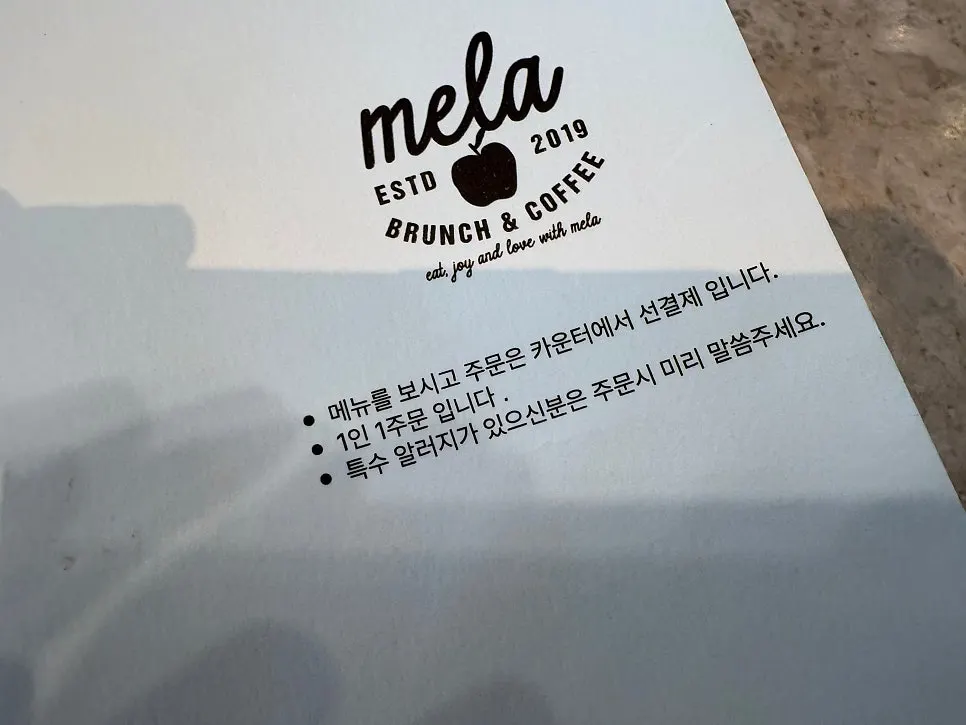 Mela's dining hall atmosphere with family customers
