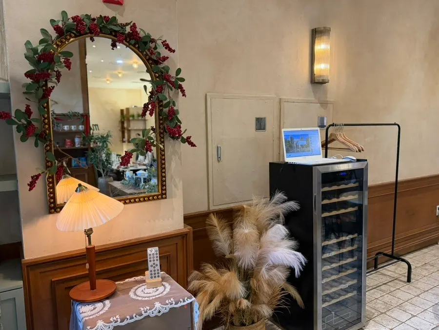 A vintage-styled corner decorated with objets and props