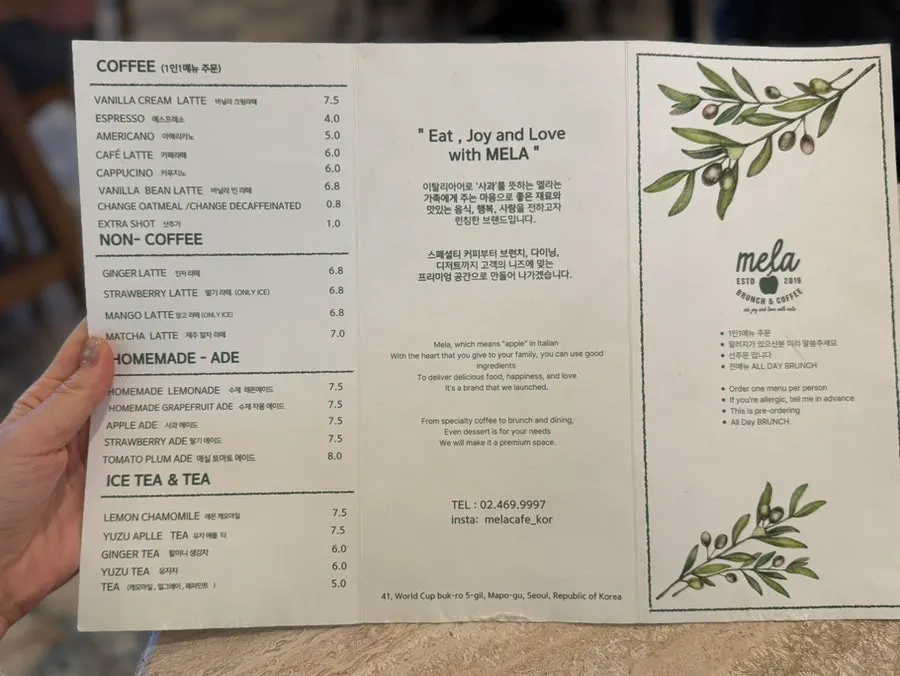 MELA Hongdae menu board listing steak and pasta
