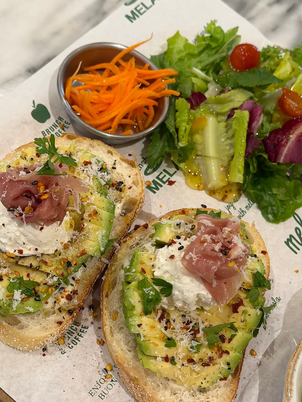 Open sandwich topped with ricotta cheese