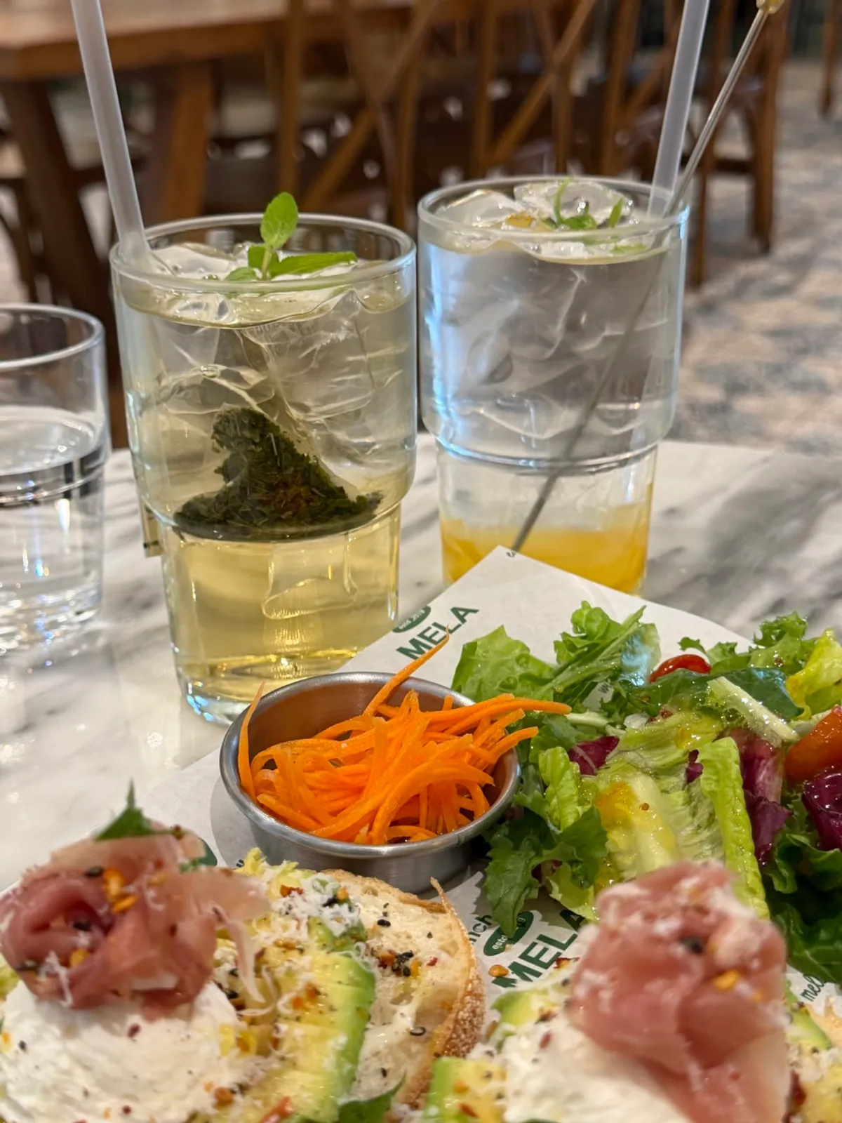 Finishing touches on a brunch spread at MELA Hongdae