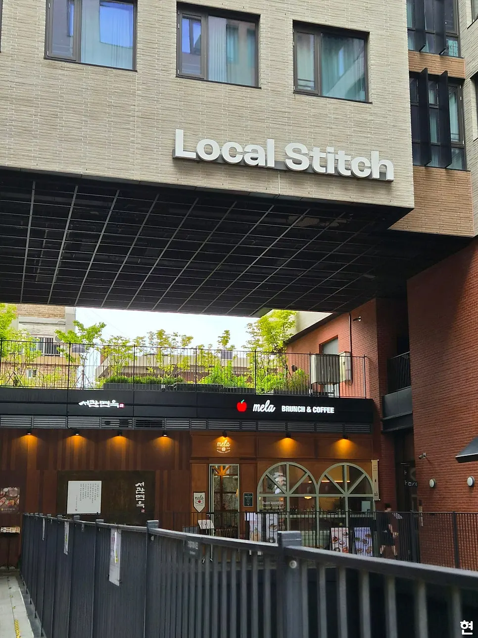 Exterior of the Nudit Hongdae building where MELA Hongdae is located