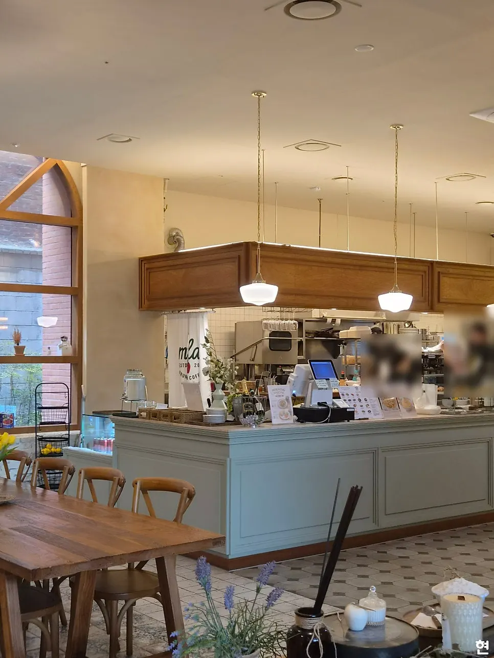 Warm-toned interior of MELA Hongdae