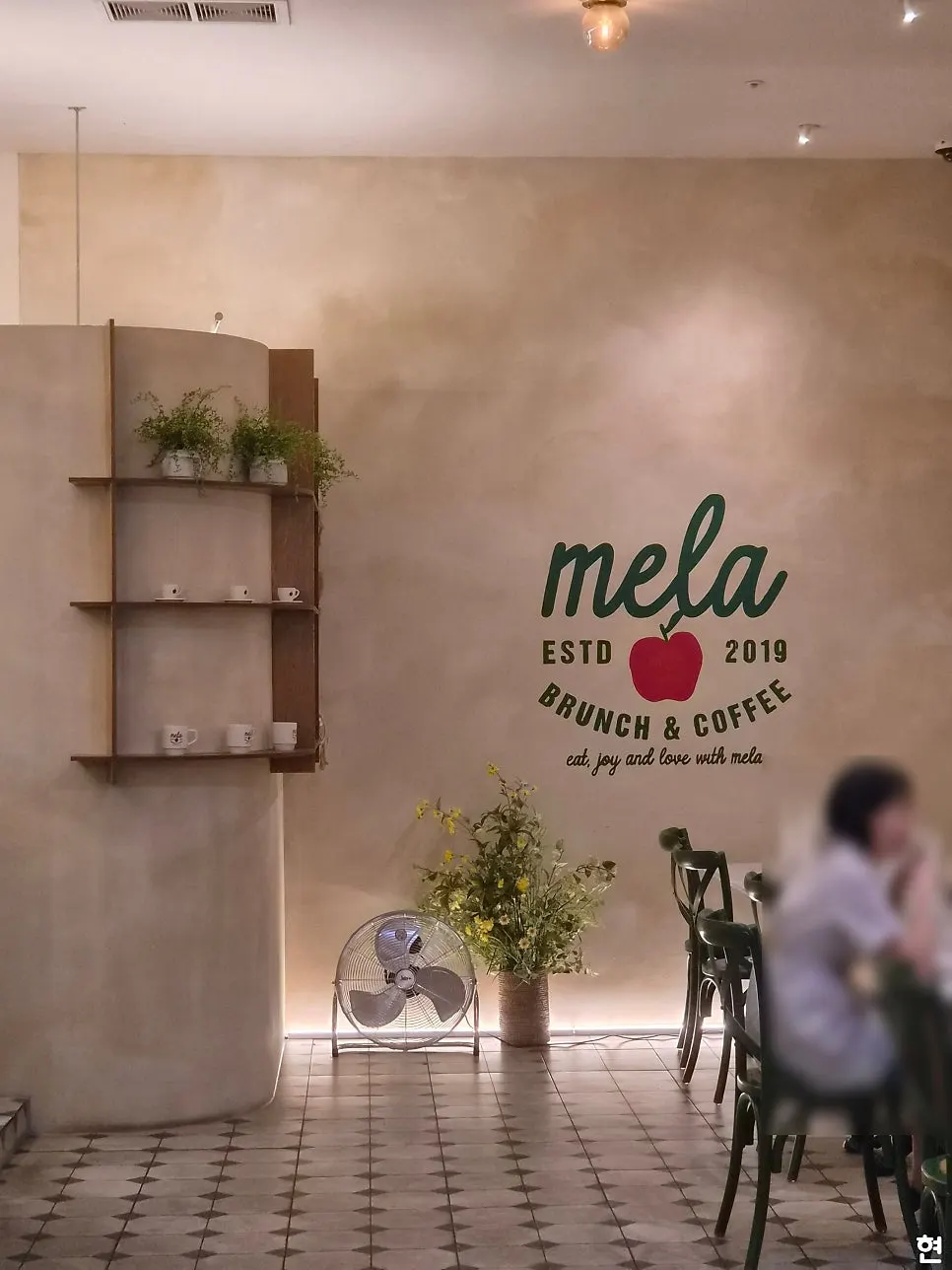 High-ceilinged dining hall at MELA Hongdae