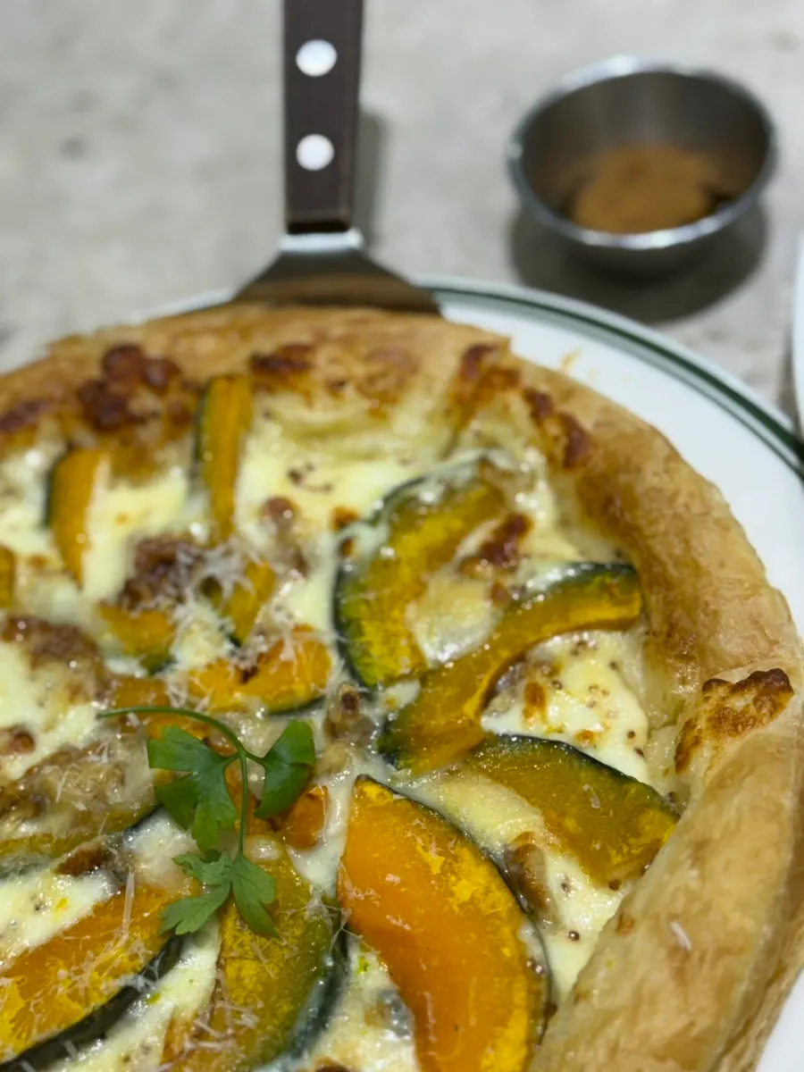 Lifting up a slice of pizza