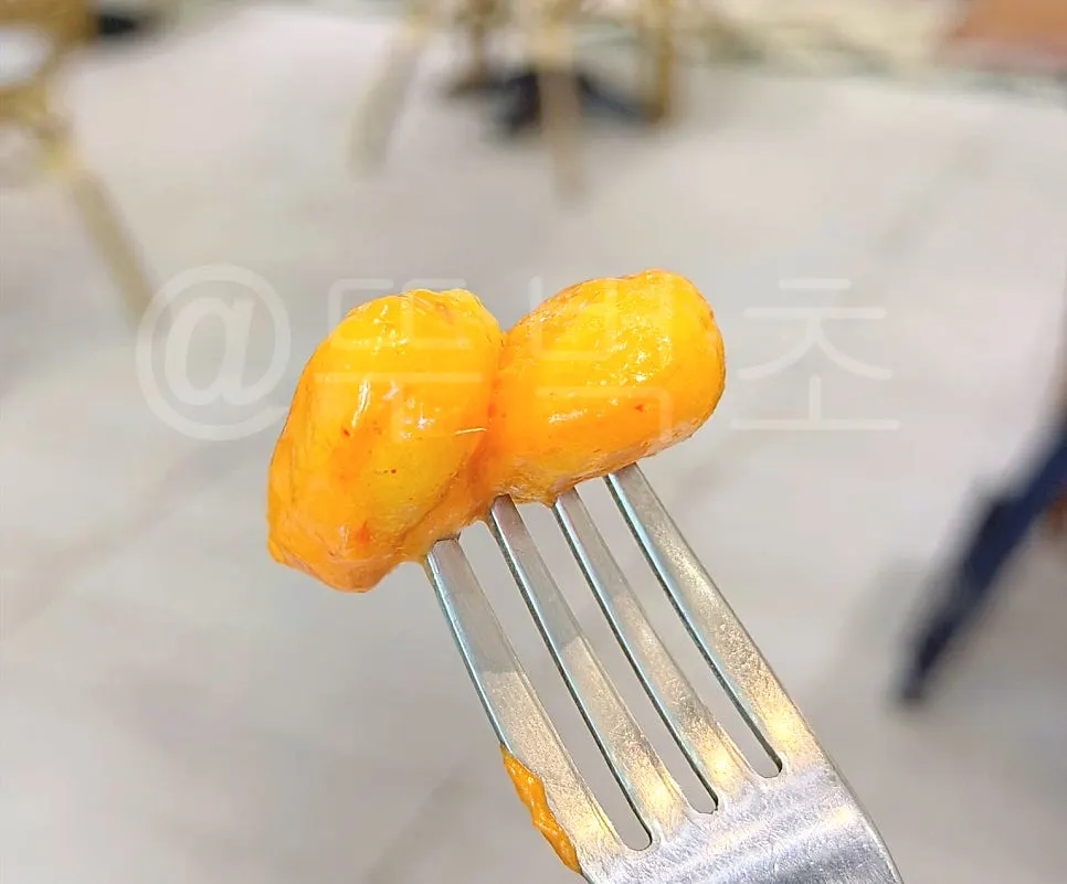 Single serving portion of rose corn gnocchi