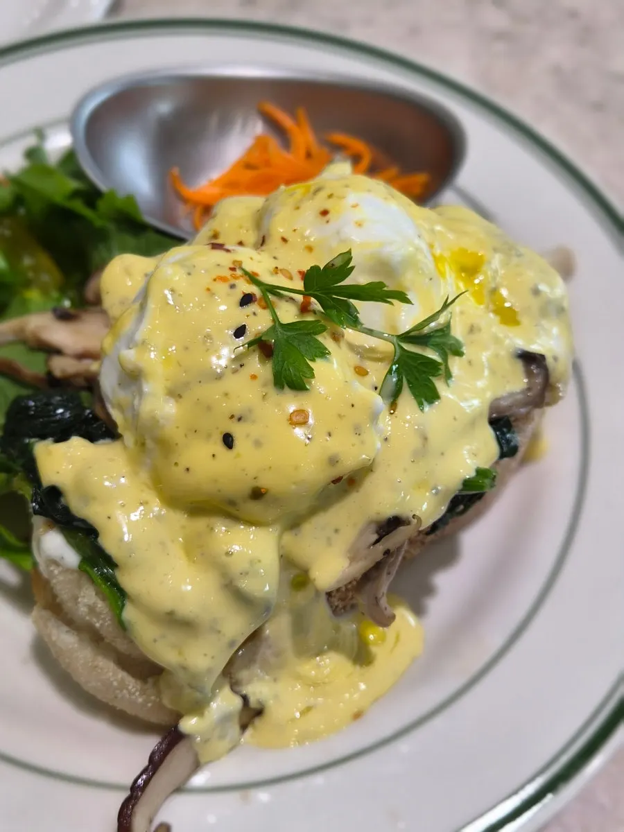 Eggs benedict with mushrooms and truffle blended in