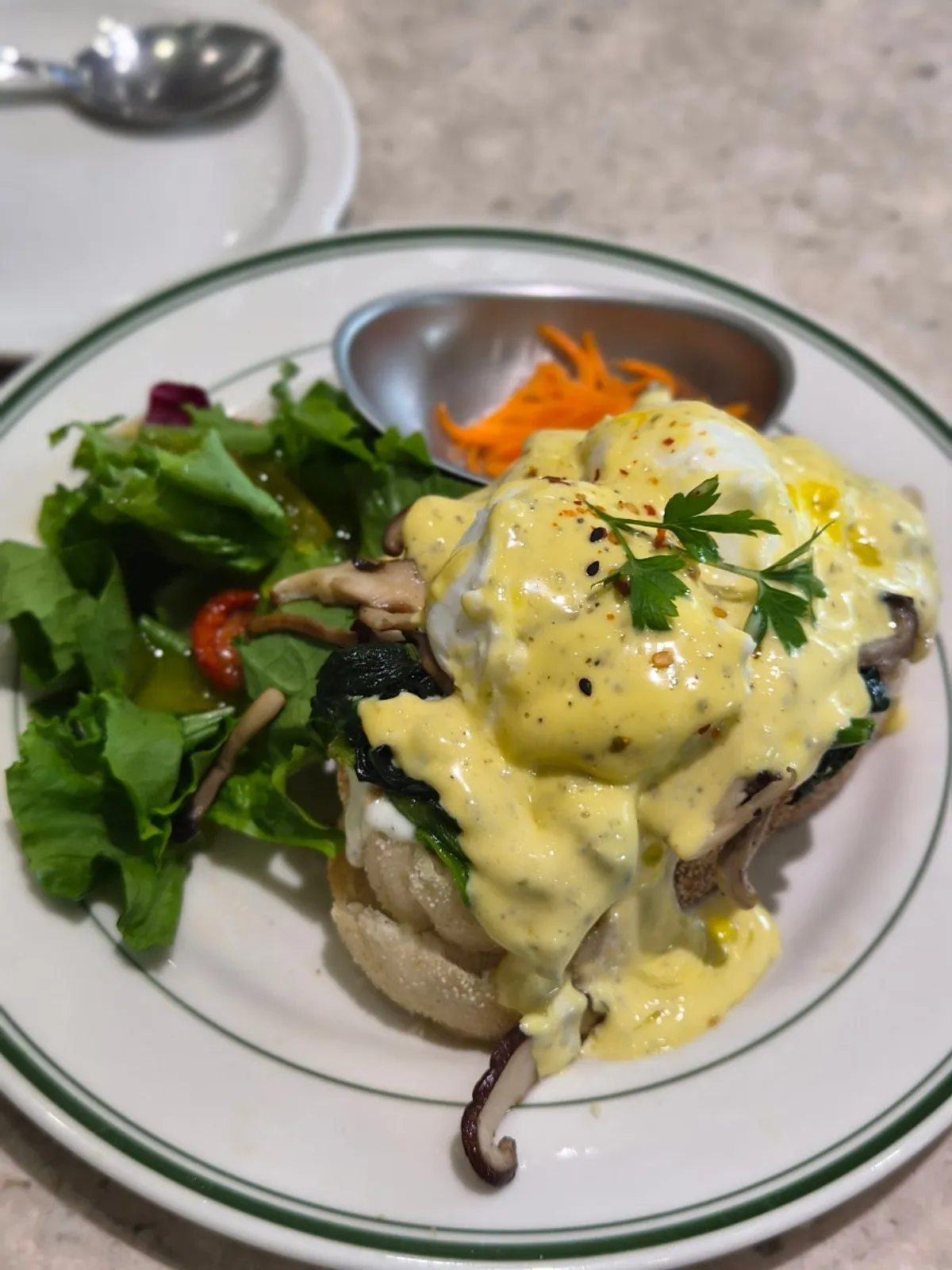 Close-up of Mela Times Square's truffle mushroom eggs benedict