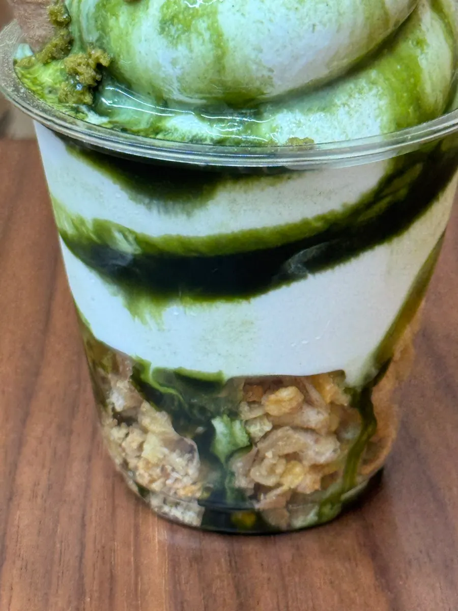Matcha ice cream topped with Jeju matcha sauce and crunch