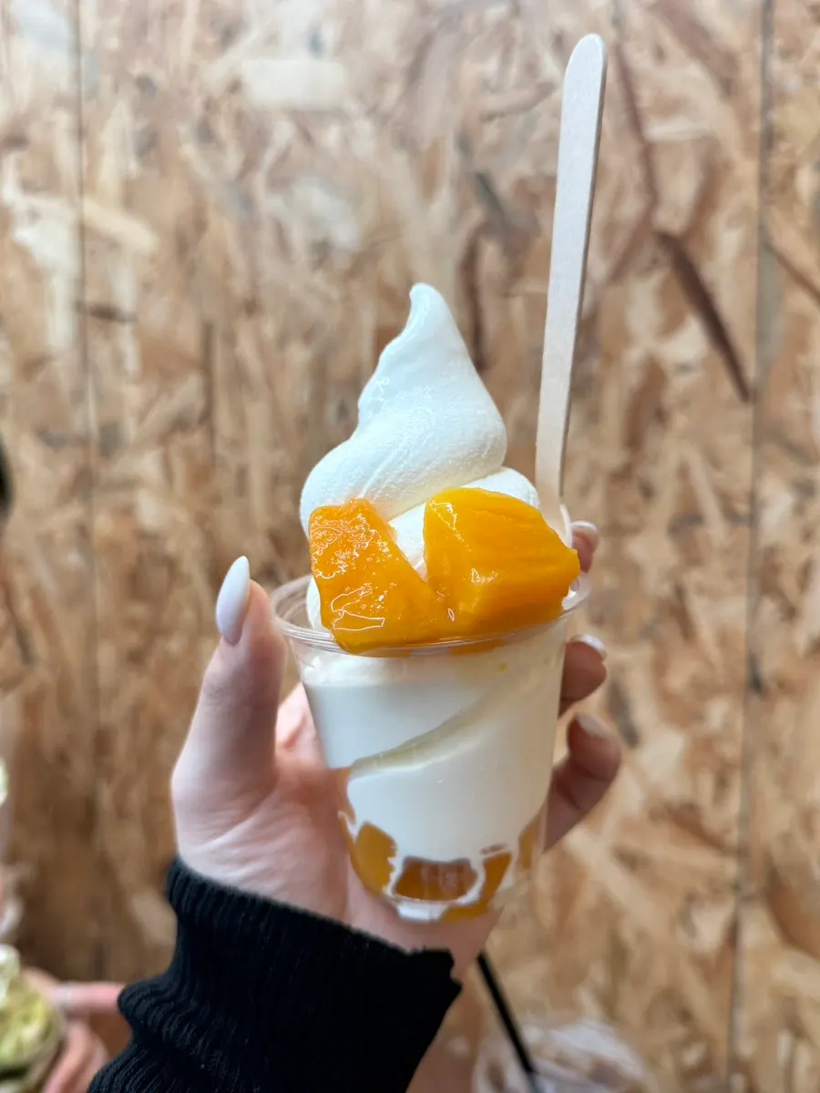 Mellows ice cream topped with mango flesh
