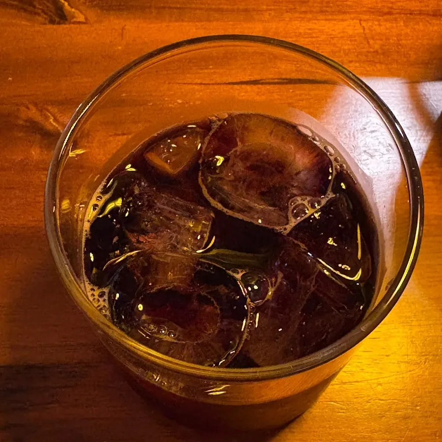 A complimentary glass of kalimotxo