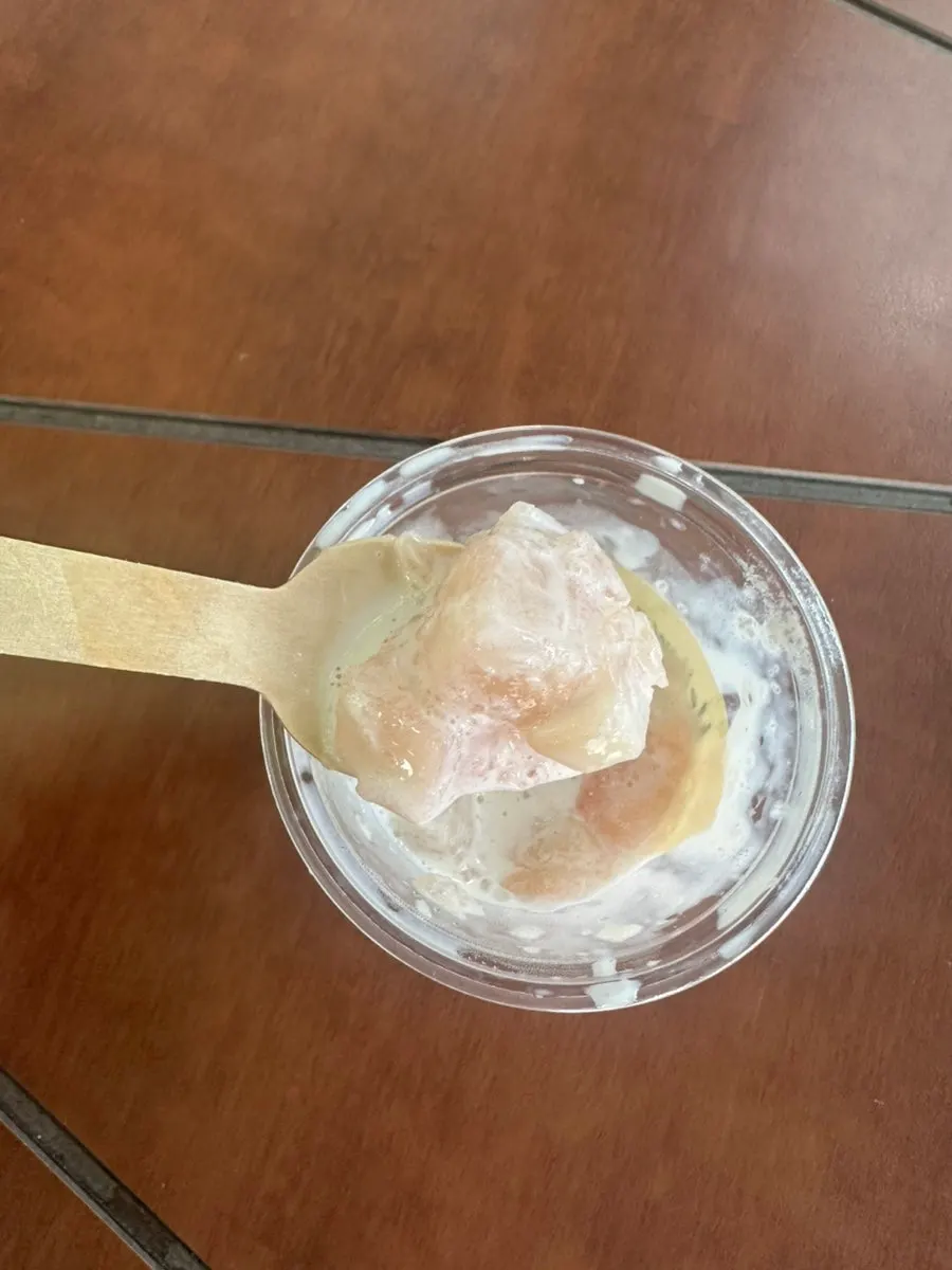 Cross-section of soft serve with peach inside