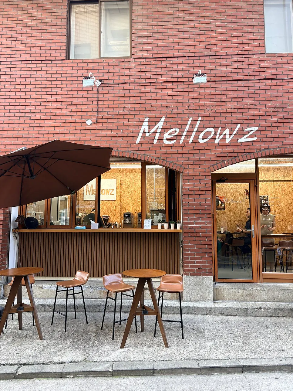Exterior of the red-brick Mellows café