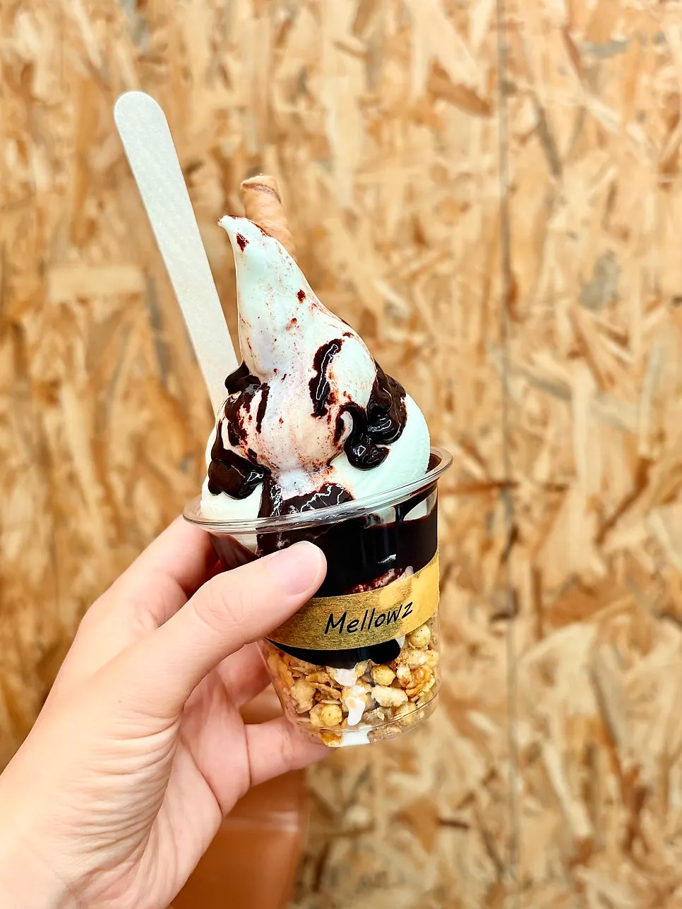 Soft serve drizzled with chocolate syrup