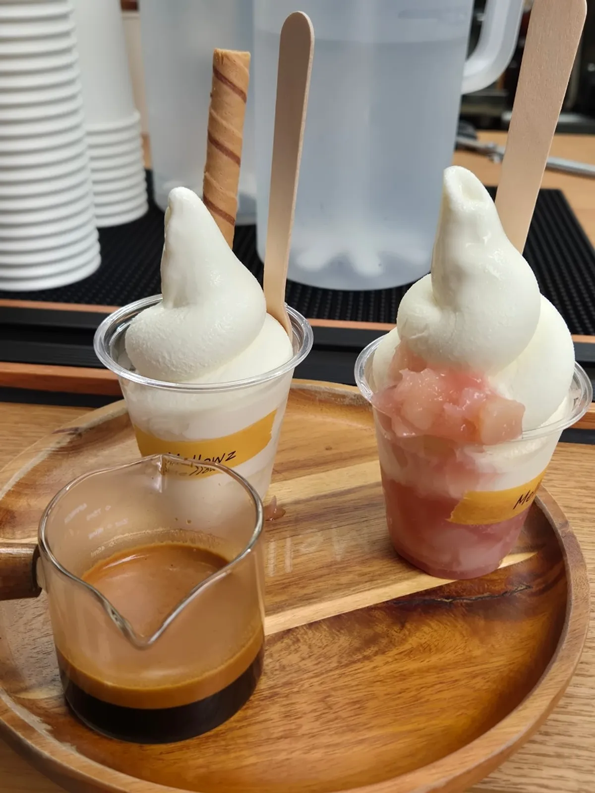 Affogato and peach ice cream placed on the table