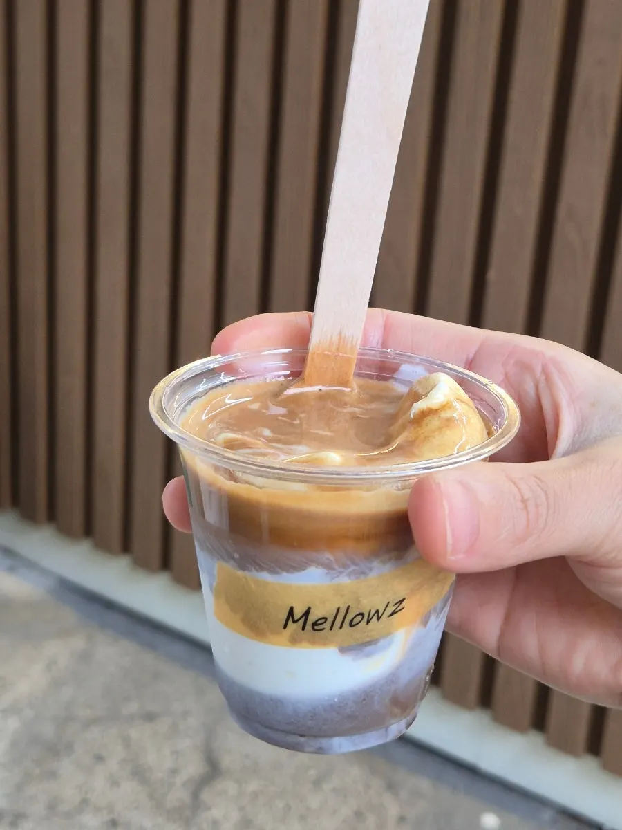 Affogato mixed with a poured espresso shot