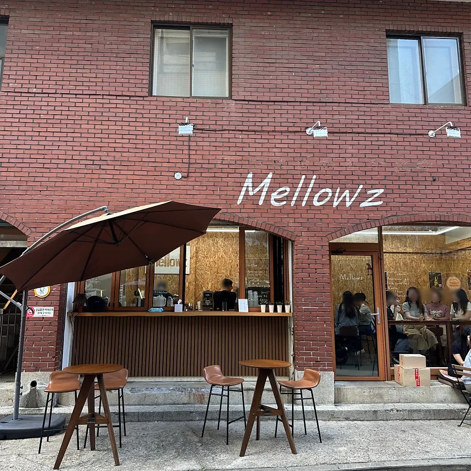 Brick exterior of the Mellows storefront