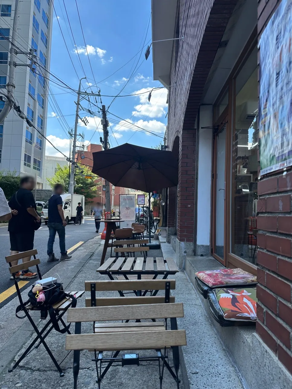 Seated at the outdoor seats at Mellows