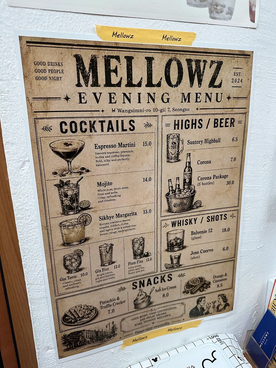 Menu board listing cocktails, alcohol, and snacks
