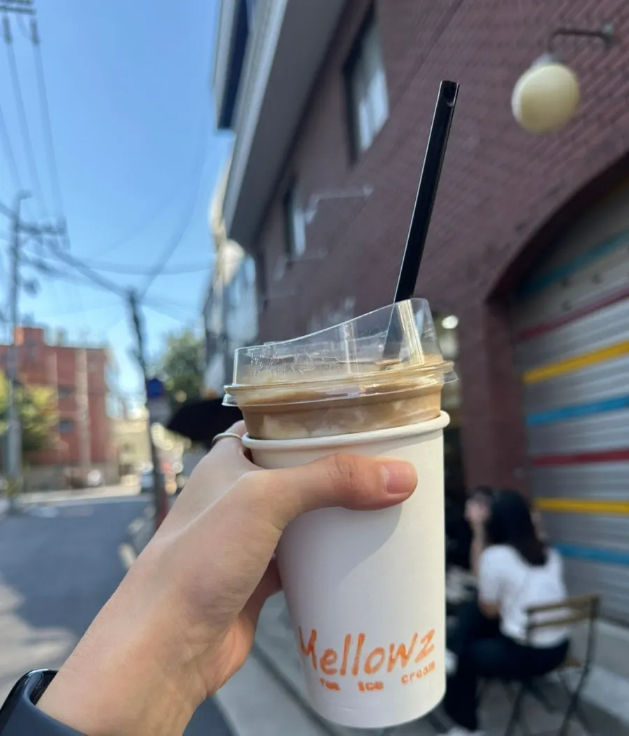 Mellows ice cream topped with peach