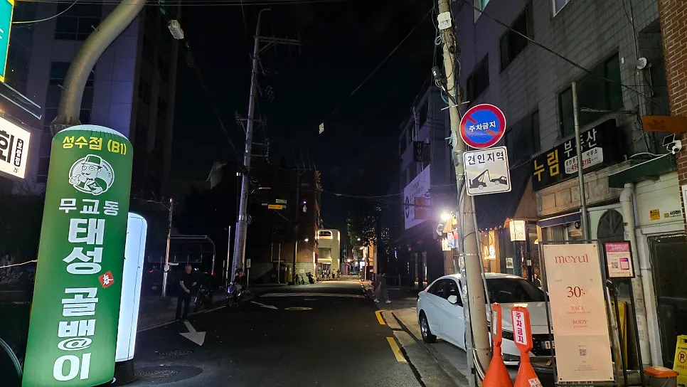 Alley view with the Mellows sign visible