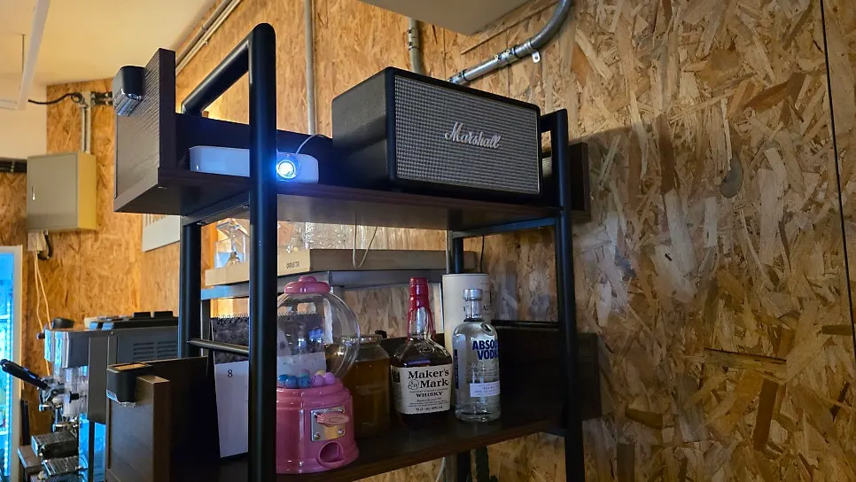 Bar area at Mellows with the coffee machine and liquor bottles displayed