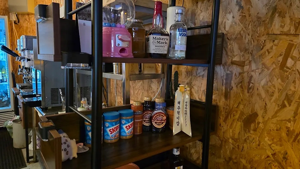 Sign listing milk and fruit soft serve flavors