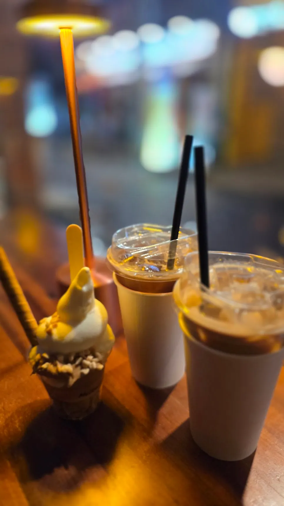 Peanut butter soft serve served alongside an iced latte