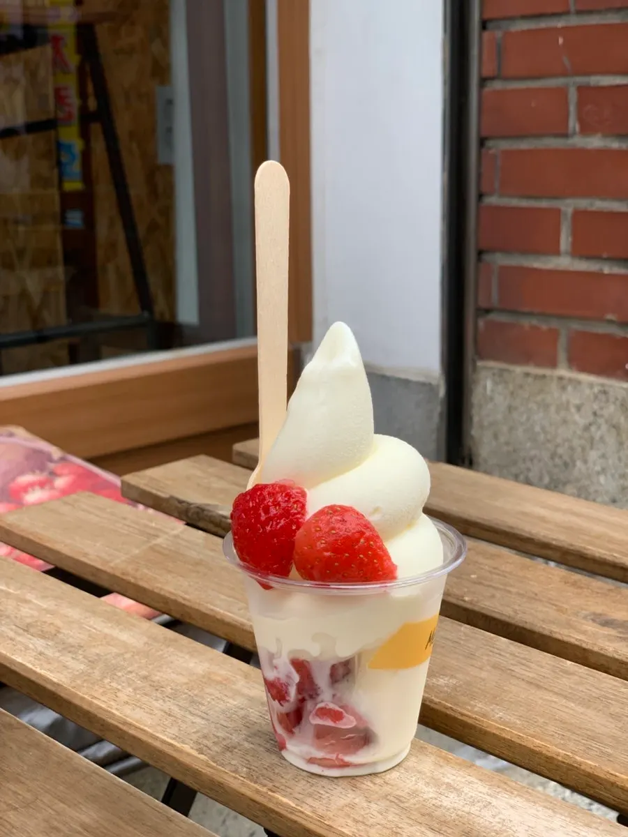 Strawberry and milk ice cream combination