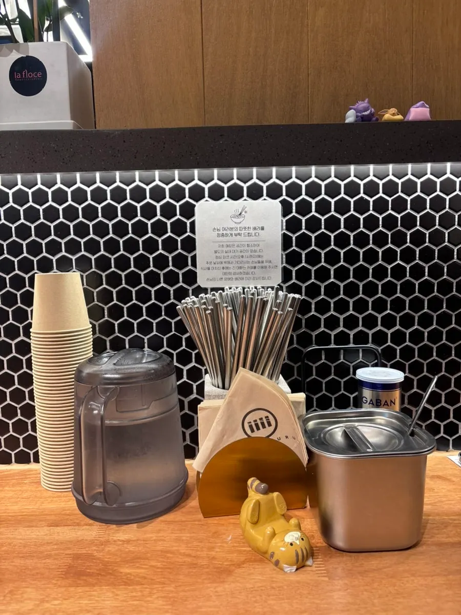 Mixing the abura soba noodles