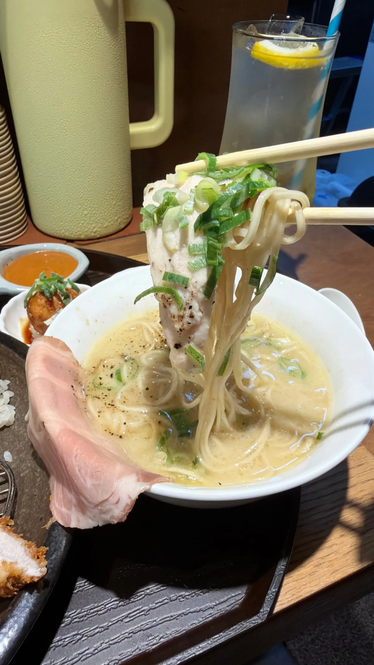 Tori paitan mini ramen topped with chicken and scallions