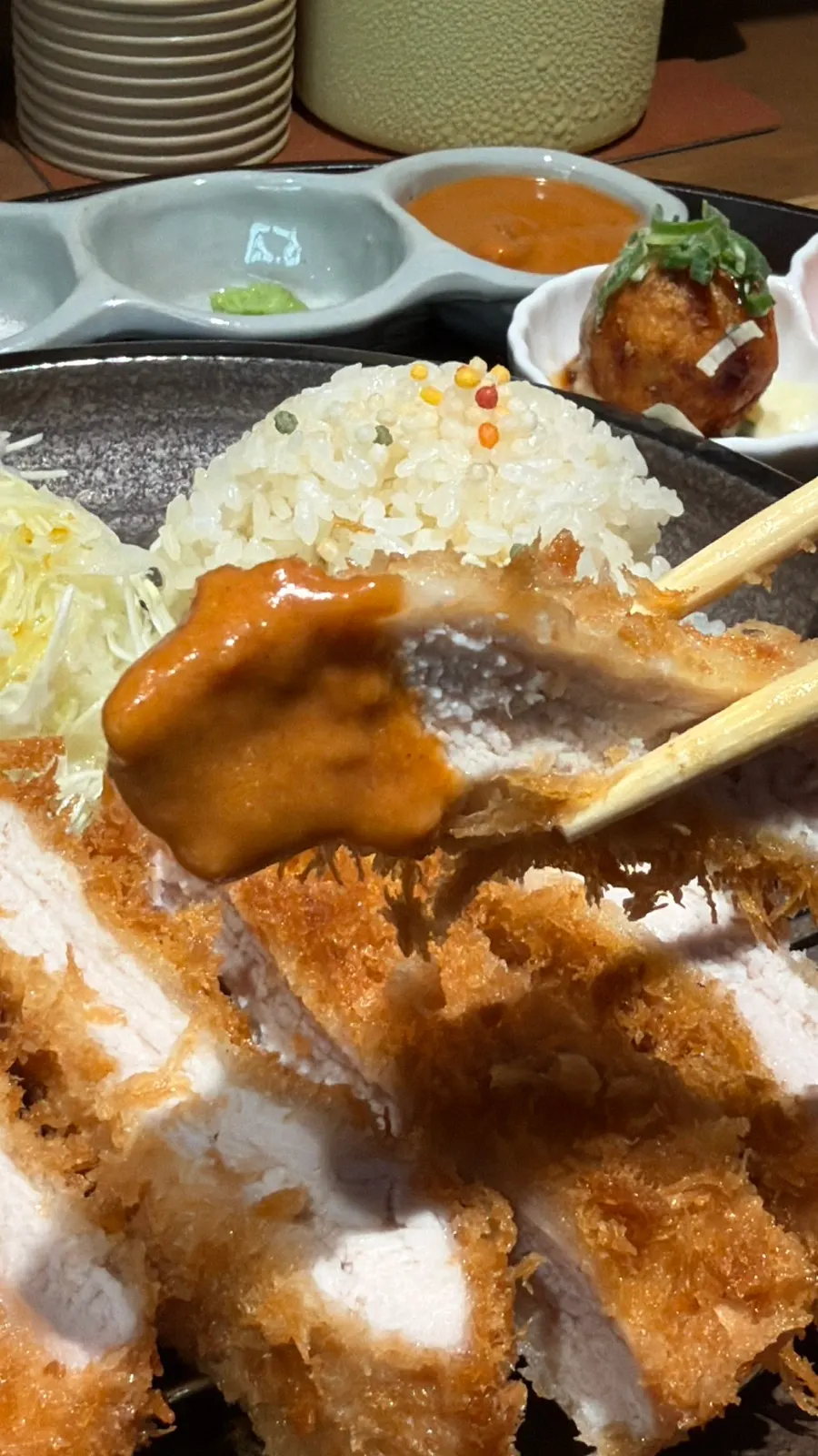 Tonkatsu set with shredded cabbage and rice on the table