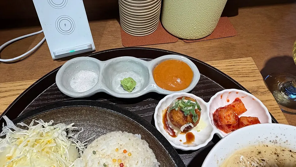 Sauce and wasabi plate served alongside the tonkatsu