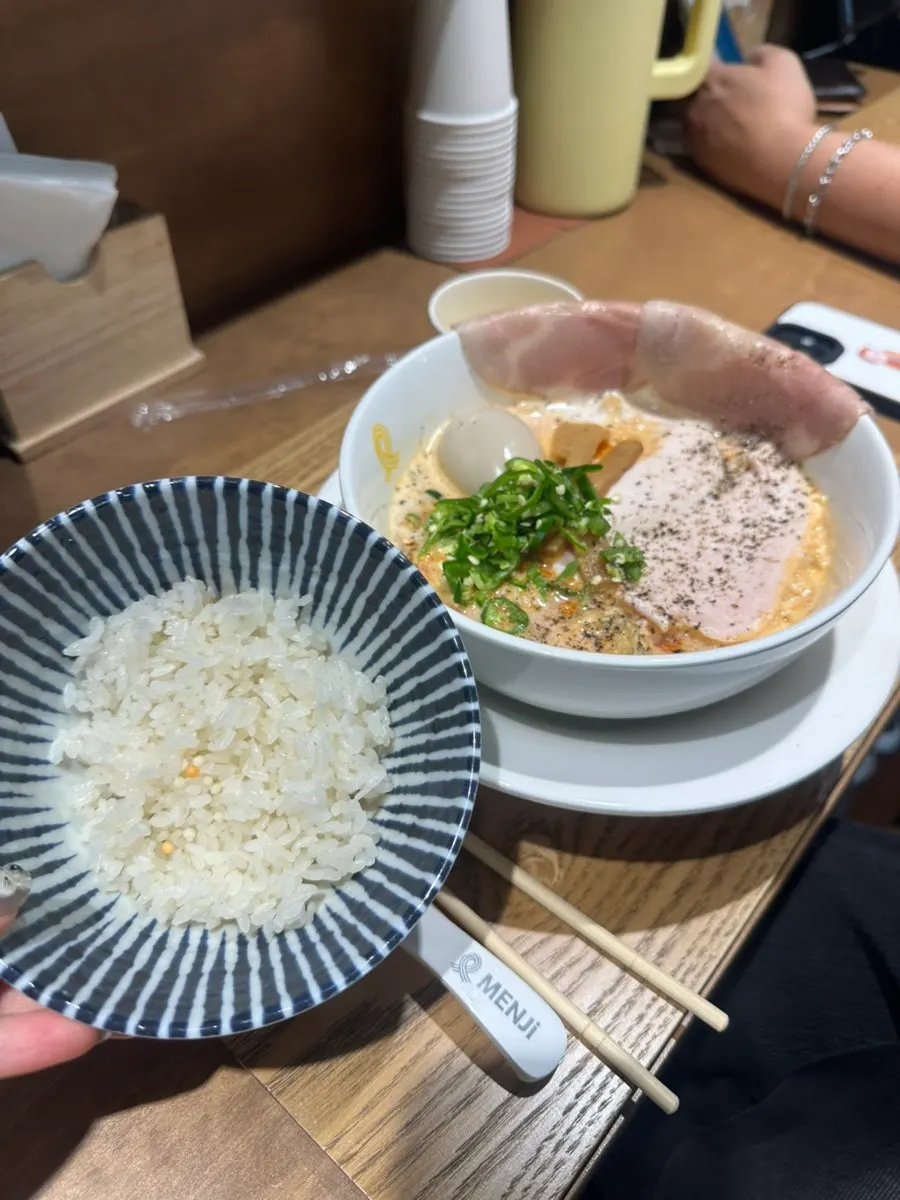 Table with ramen and mini rice combo