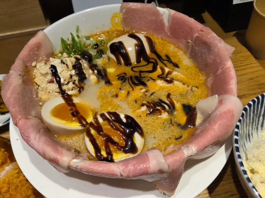 Menji's mini pork loin tonkatsu with special sauce served first