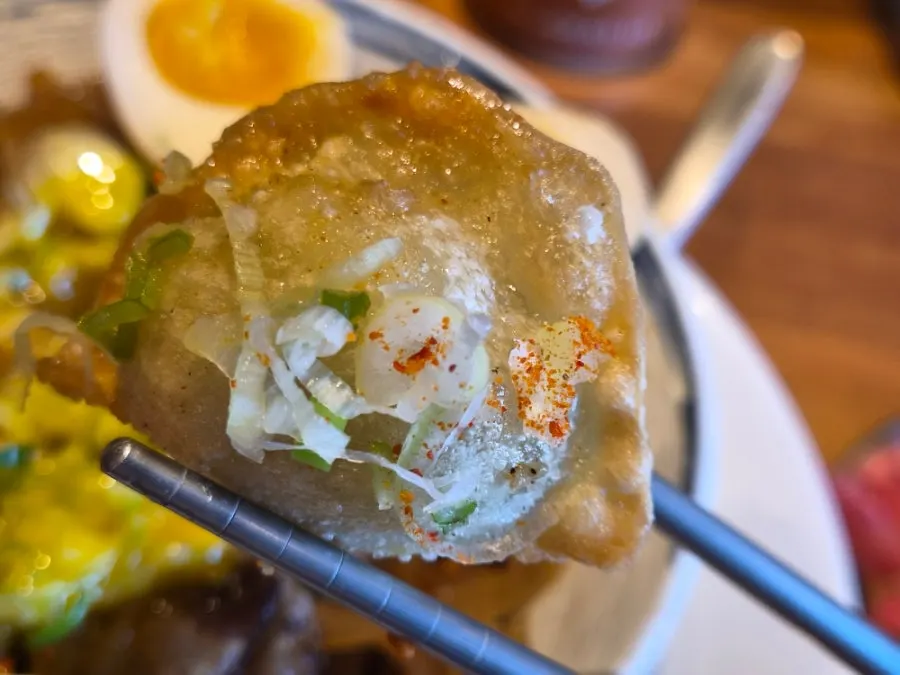 Close-up of a spoonful of gyudon