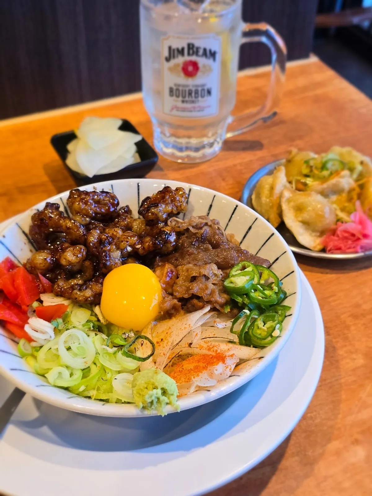 Vertical photo of hormone-don beef intestine rice bowl at Mentsuru Children's Grand Park Branch