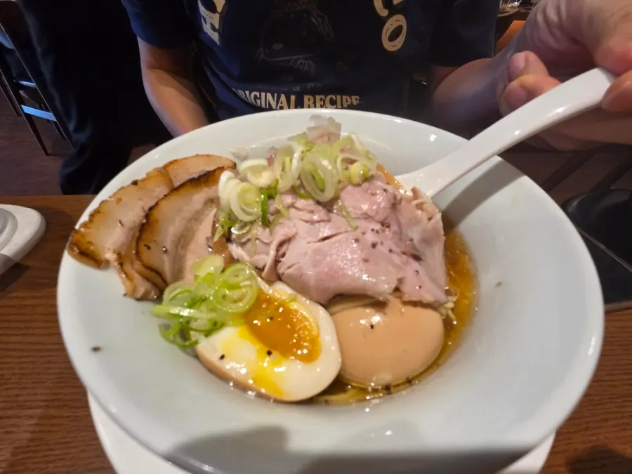 Noodles lifted up from the motsu ramen