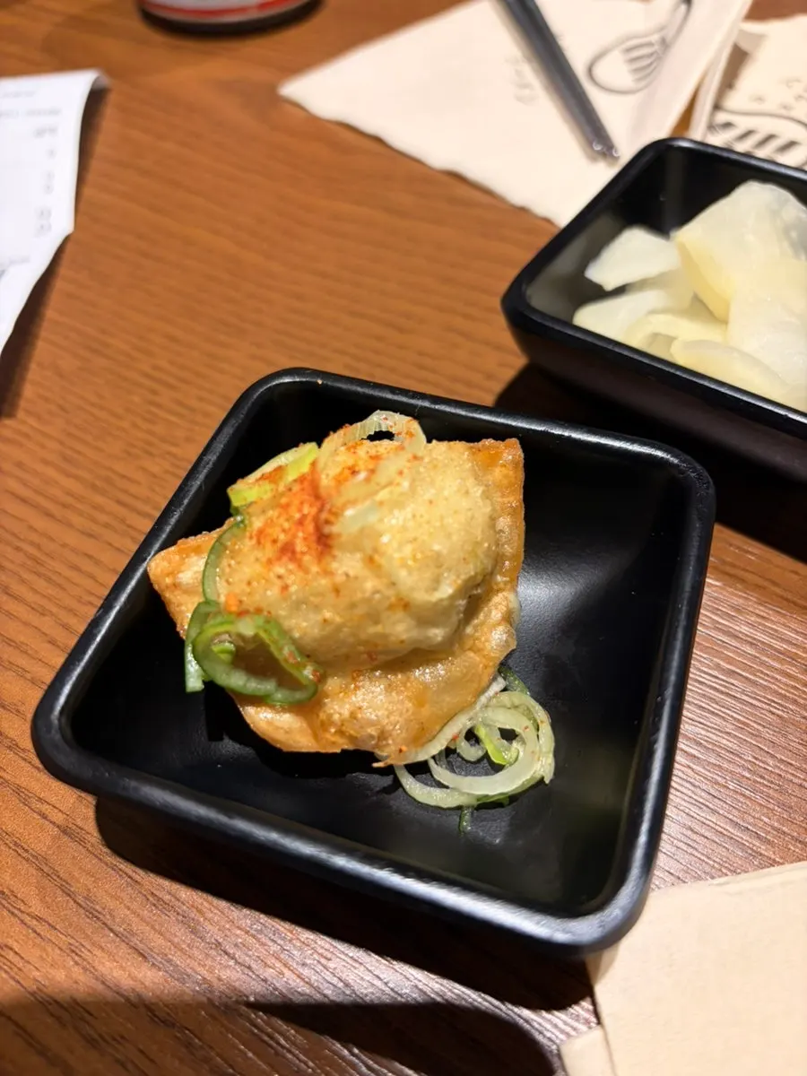 A plate of crispy pan-fried gyoza at Mentsuru
