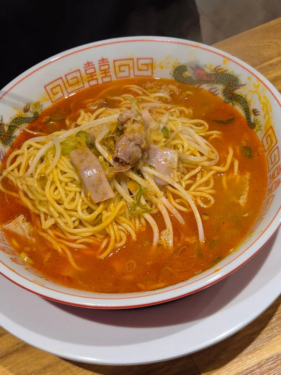 Close-up of beef intestine toppings on motsu ramen