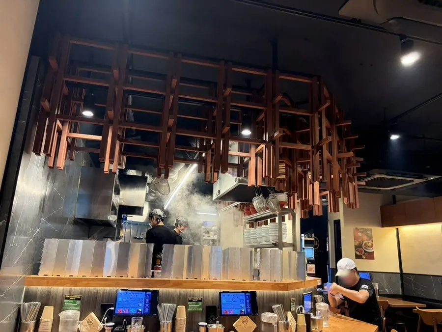 Interior of Mentsuru showing the open kitchen