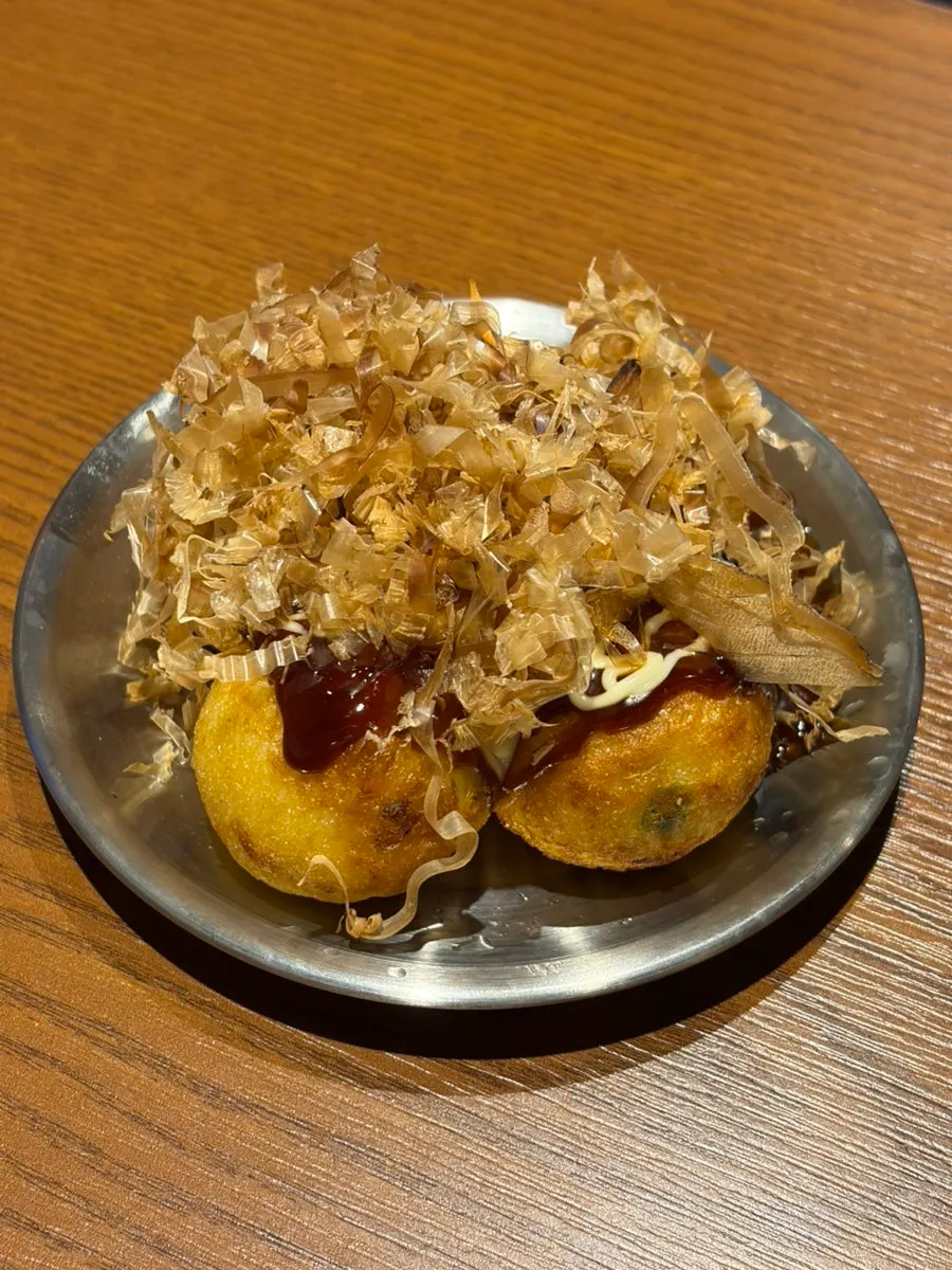 Four pieces of taco-yaki received via Naver Reservation coupon