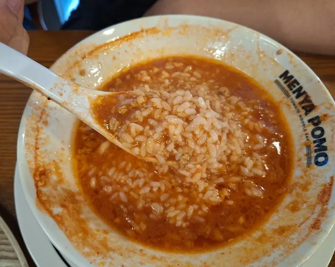 Tomato ramen broth with free rice