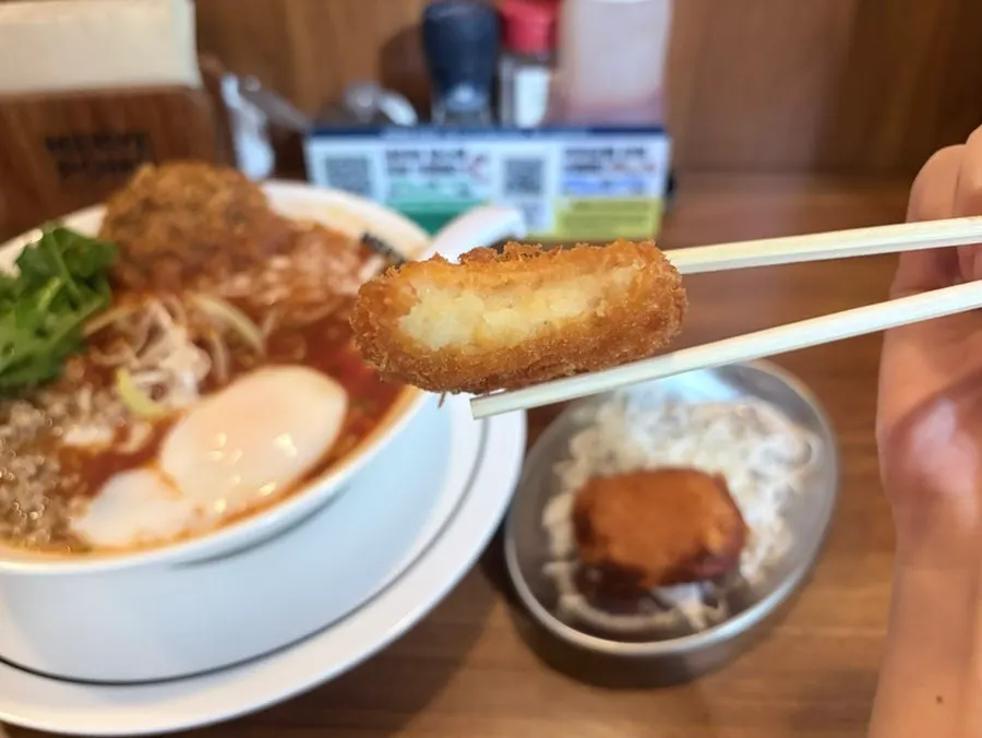 Cross-section of a potato croquette cut in half
