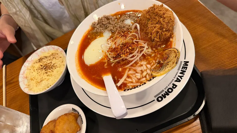 Tom yum tomato ramen topped with Korean beef cutlet