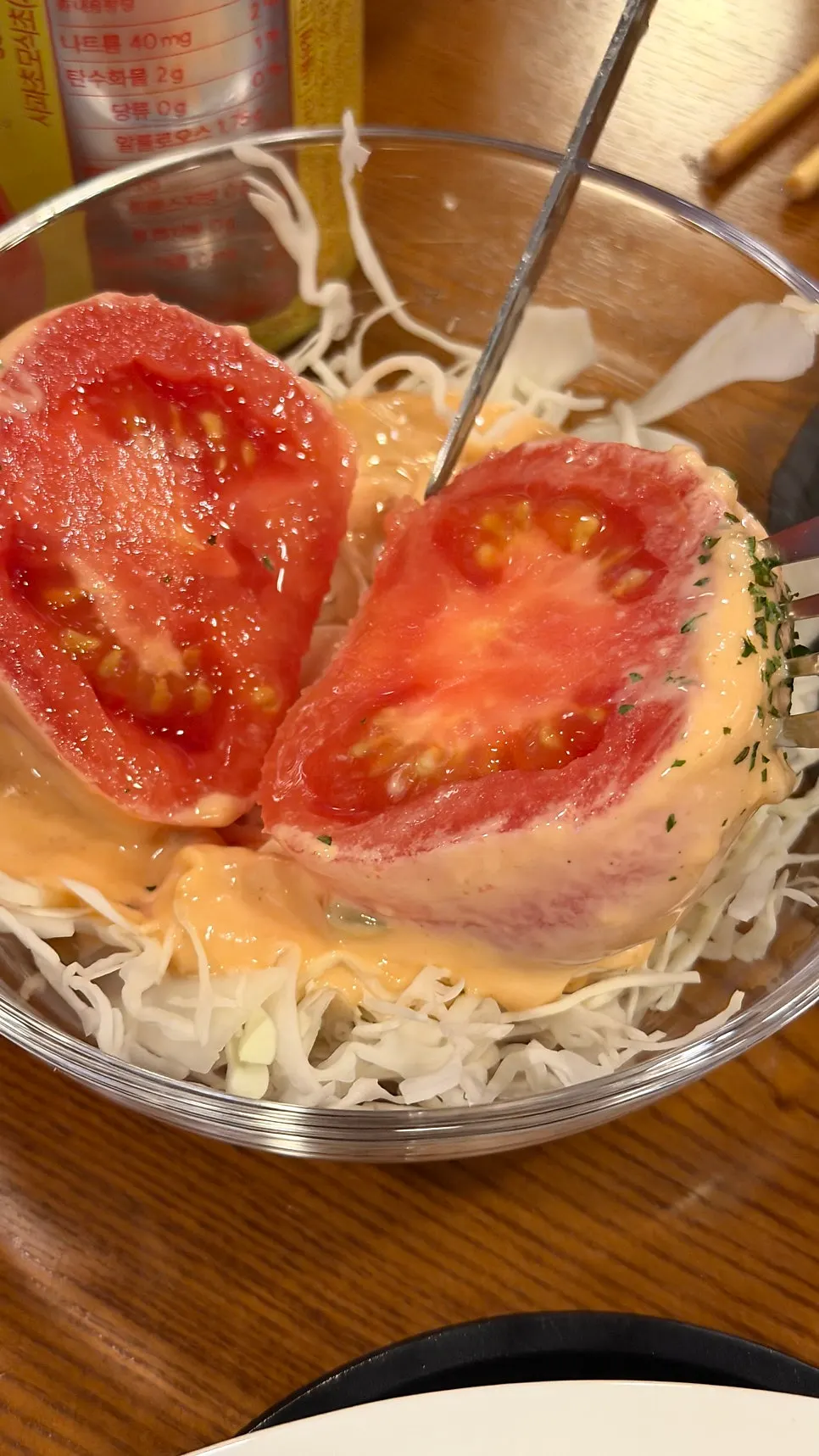 Tomato salad with a generous amount of sauce on top