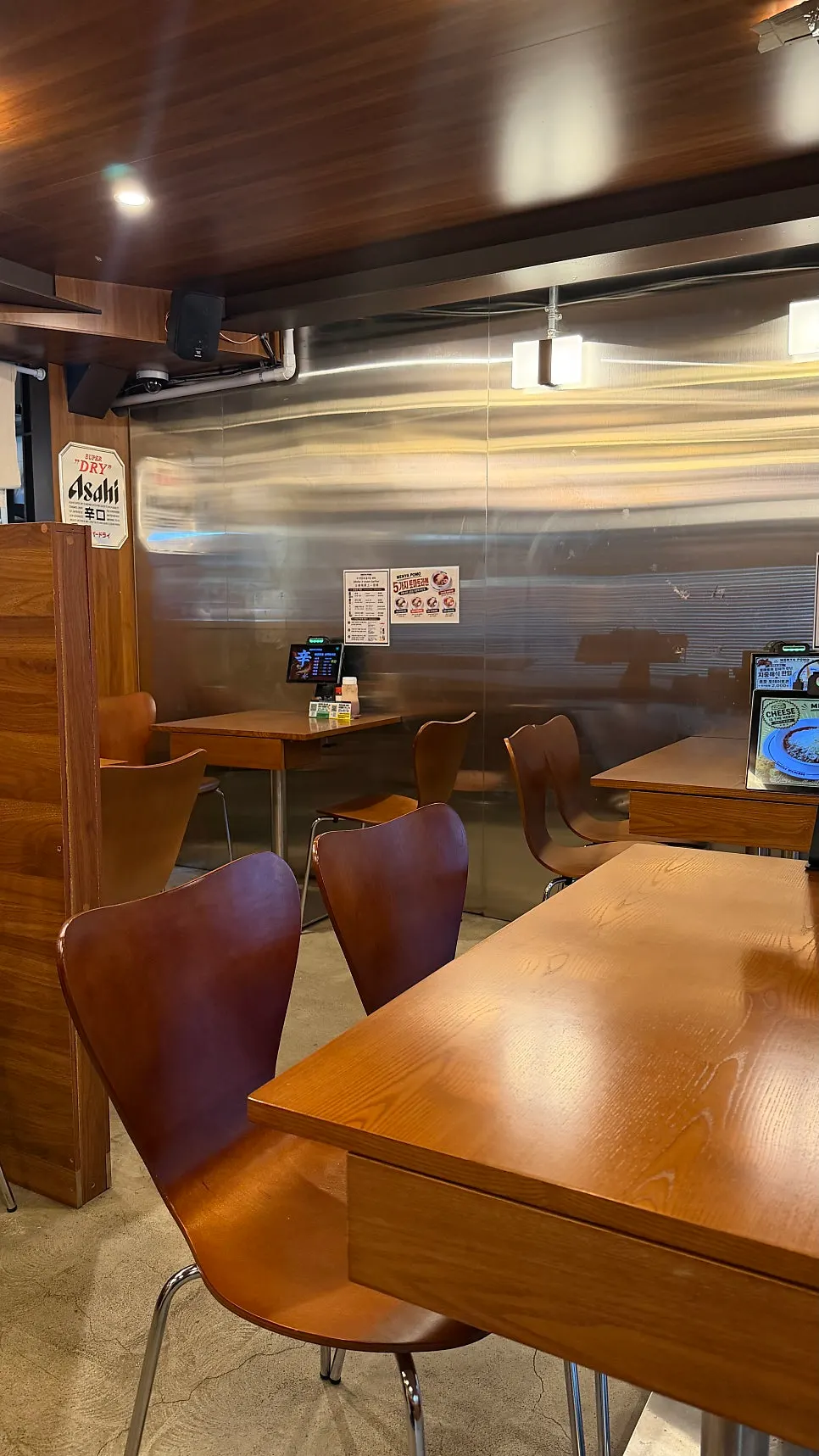 A meal scene with tomato ramen and side dishes together