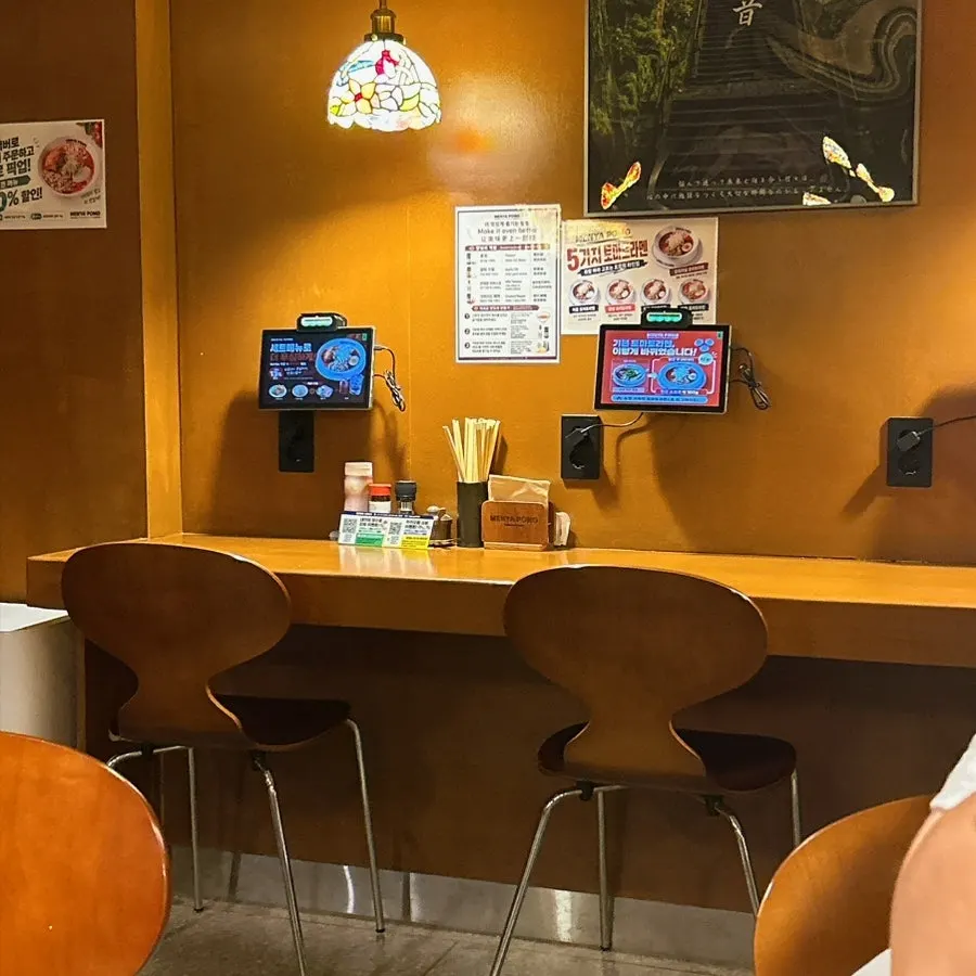 Ramen menu sign displayed in front of the restaurant