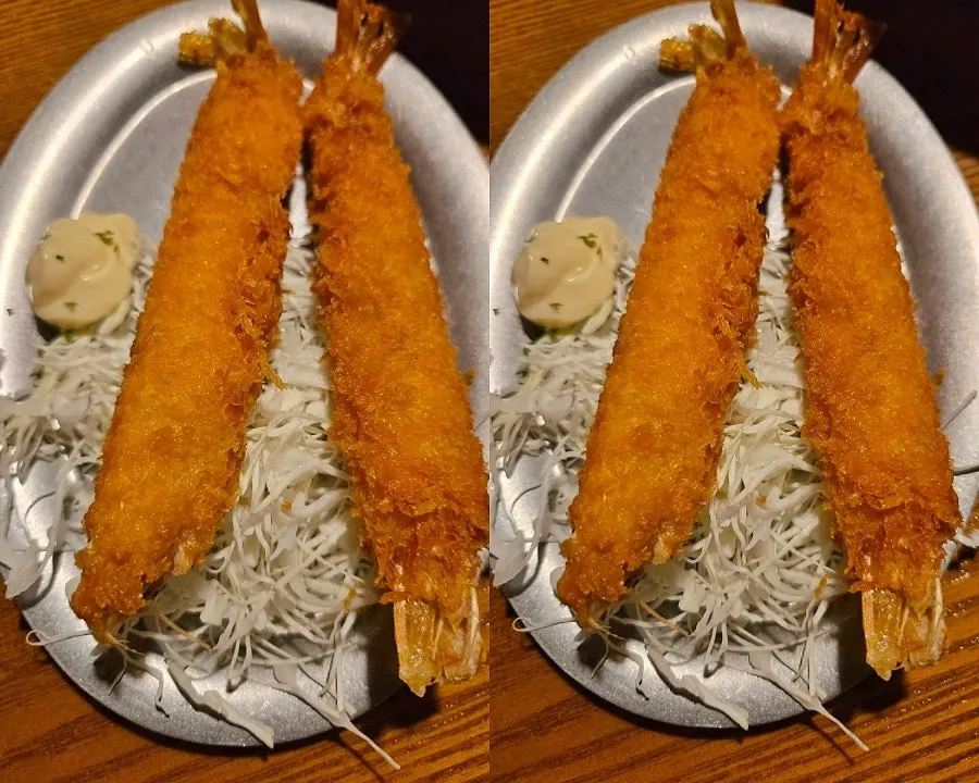 Dipping the cutlet into the sauce